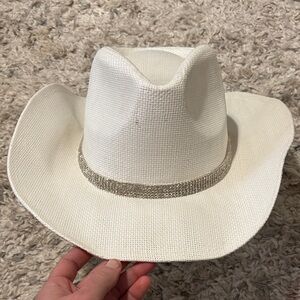 White Cowgirl Hat with Silver Band of jewels around it. New